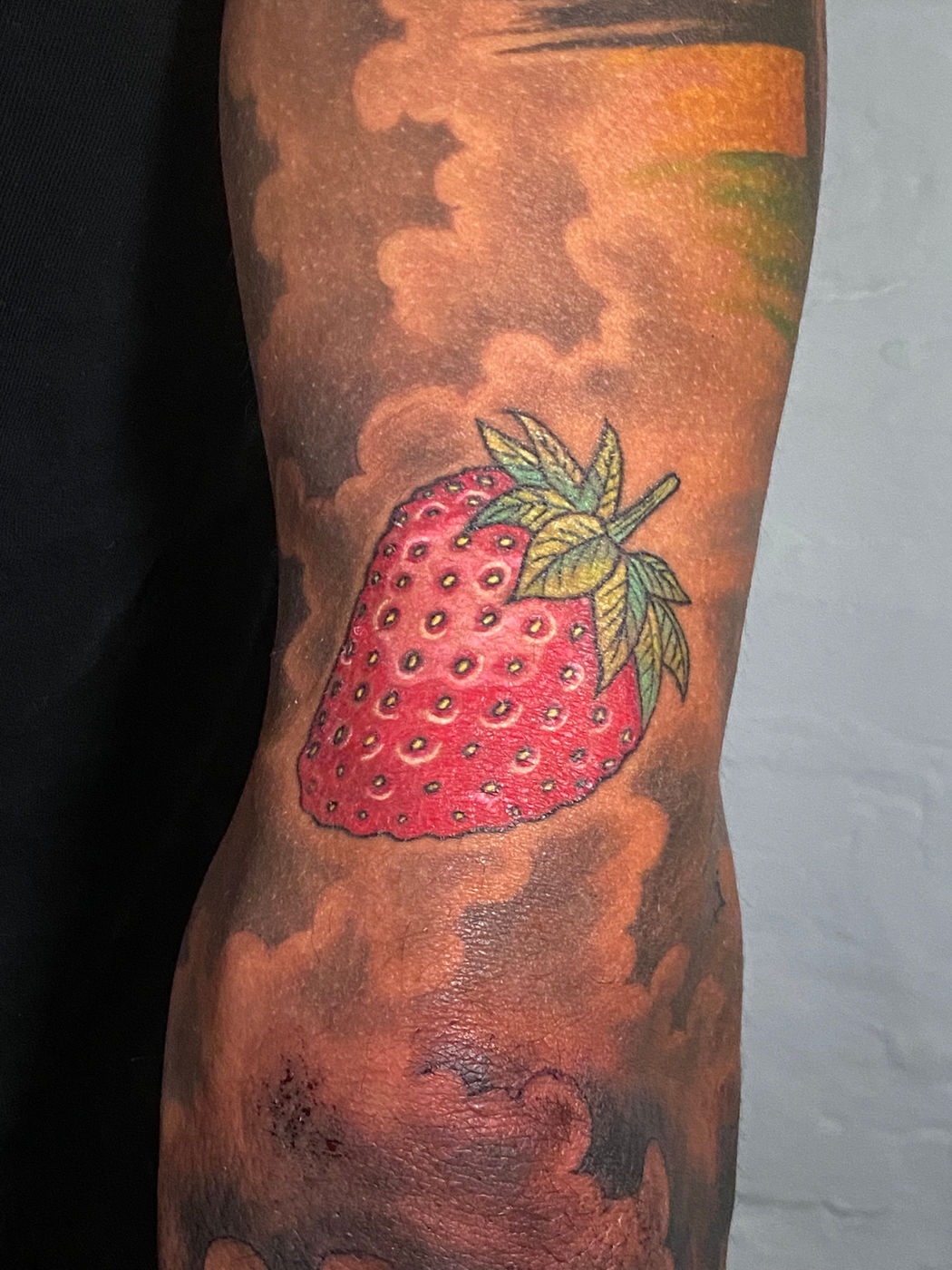 Colour strawberry tattoo